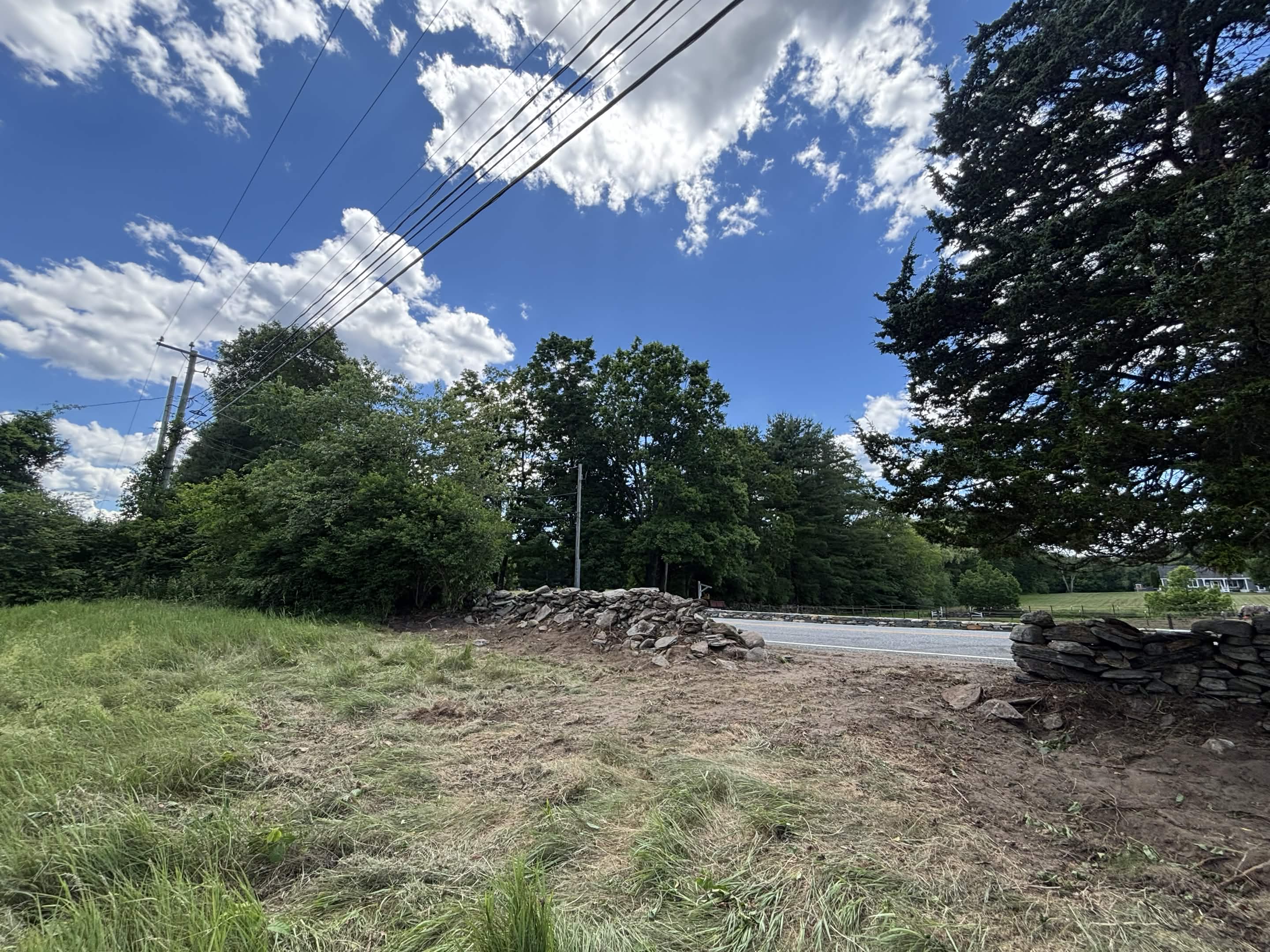 Restored outdoor space after overgrowth cleared in Putnam, CT